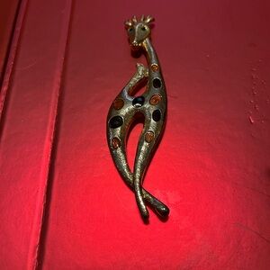 Source Unknown Elegant Gold and Black Brooch